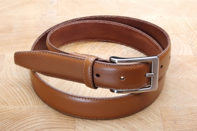 <h5>2017 30</h5><p>Made in Germany belt " Ascona" in black and cognac. Width 3 cm and length available till 115 cm.
Description: Moulded, single stitched and shortable</p>