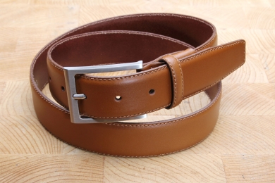 <h5>2016 35</h5><p>Made in Germany belt " Ascona" in black and cognac. Width 3,5 cm and length available till 115 cm.
Description: Moulded,single stitched and shortable</p>