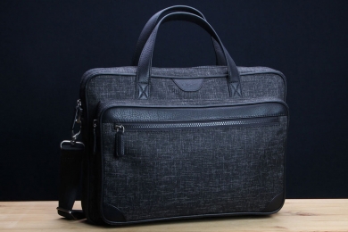 <h5>8834 36</h5><p>Businessbag with 3 slip pockets, 3 zip compartments, laptop/tablet compartment, business division and reversible shoulder strap. Size: 39 x 29 x 11 cm</p>